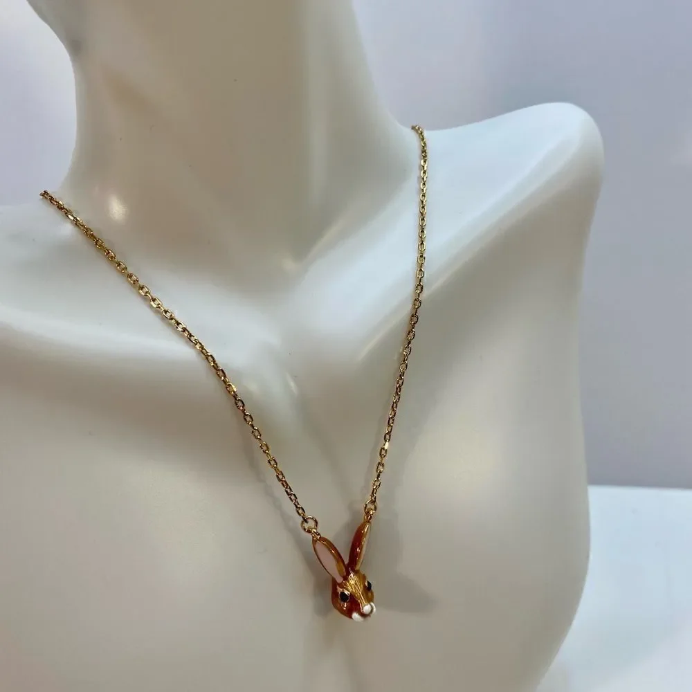 Kate Spade Desert Muse Pendant on delicate gold toned chain.